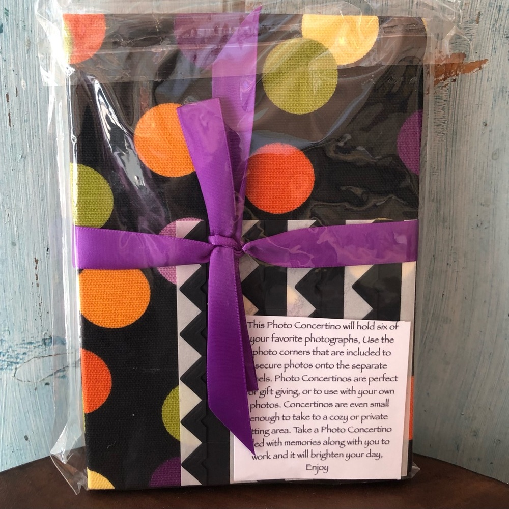 Polka-dot, fold-out photo album to hold 6 of your favorite pics
